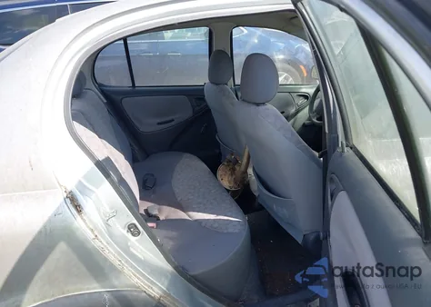 2000 Toyota Echo из США, поврежденный, VIN JTDBT123XY0091108